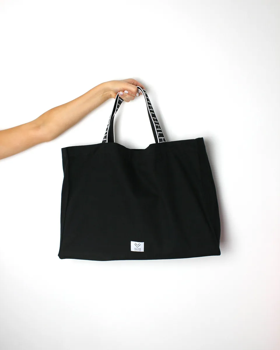Woven seagrass market basket with short handles