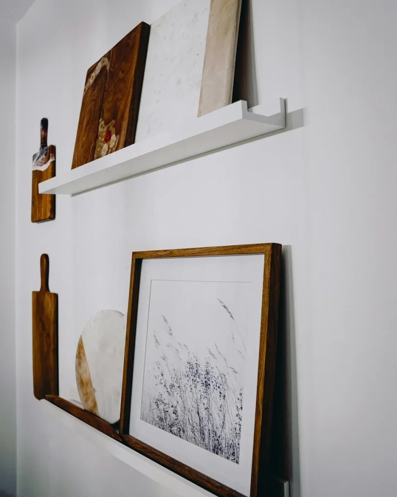 Two striped cotton tea towels on a rail